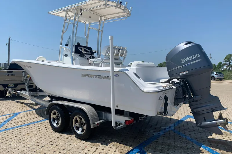 Slide: The Image of 2015 Sportsman Open 212 Center Console boat on trailer with Yamaha outboard motor. - 5