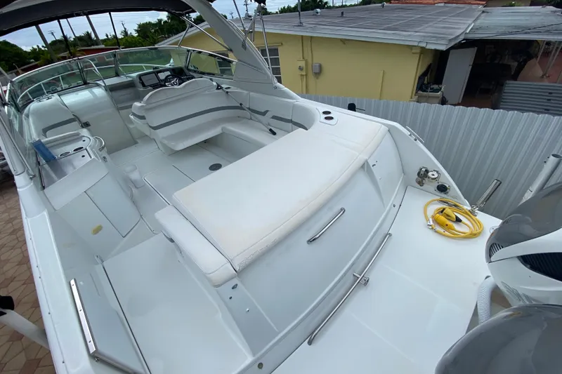 Slide: The Image of 2009 Formula 330 Sun Sport boat interior with seating and control panel. - 12