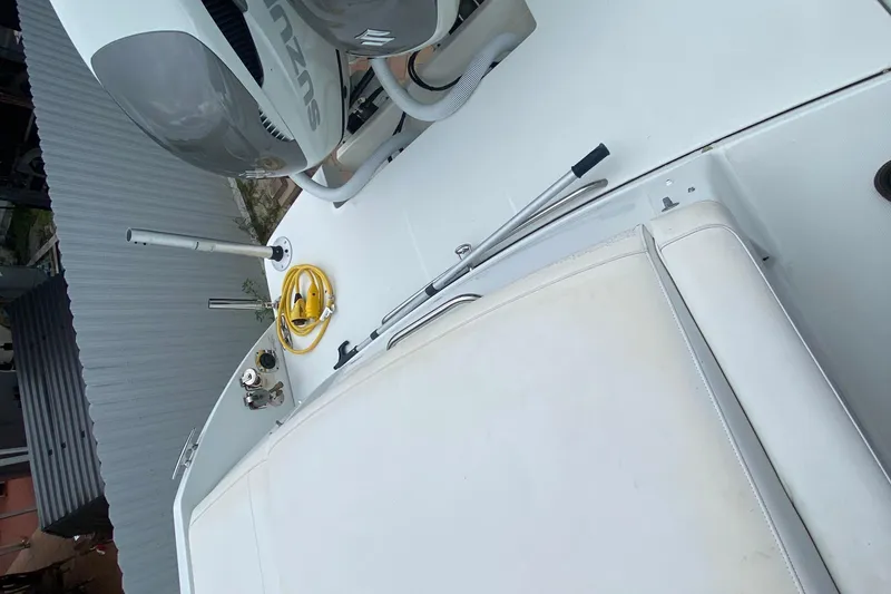 Slide: The Image of 2009 Formula 330 Sun Sport boat deck with Suzuki engine and accessories. - 26