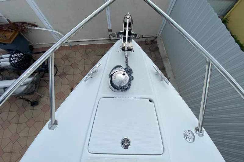 Slide: The Image of 2009 Formula 330 Sun Sport boat bow with anchor and stainless steel railings. - 7