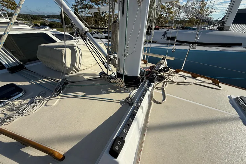 Slide: The Image of Deck of 2011 Tartan 4700 sailboat with rigging and ropes. - 20