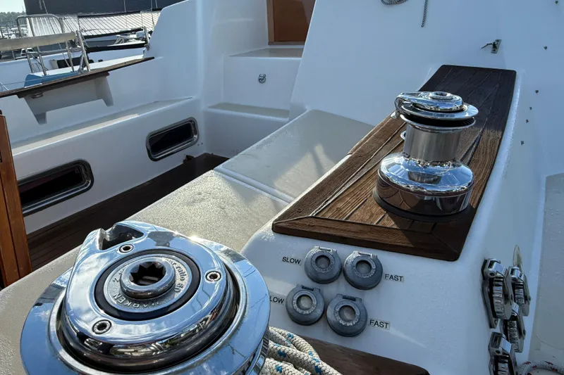 Slide: The Image of Deck of 2011 Tartan 4700 sailboat with winches and control dials. - 31