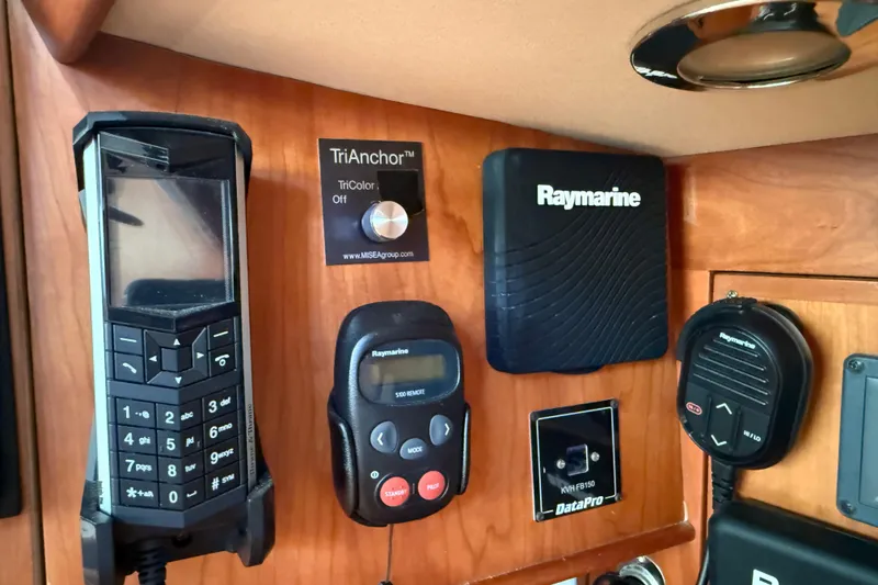 Slide: The Image of Control panel in a 2011 Tartan 4700 yacht with Raymarine equipment. - 59