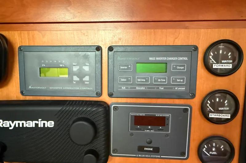 Slide: The Image of Control panel of a 2011 Tartan 4700 yacht with Mastervolt and Raymarine systems. - 60