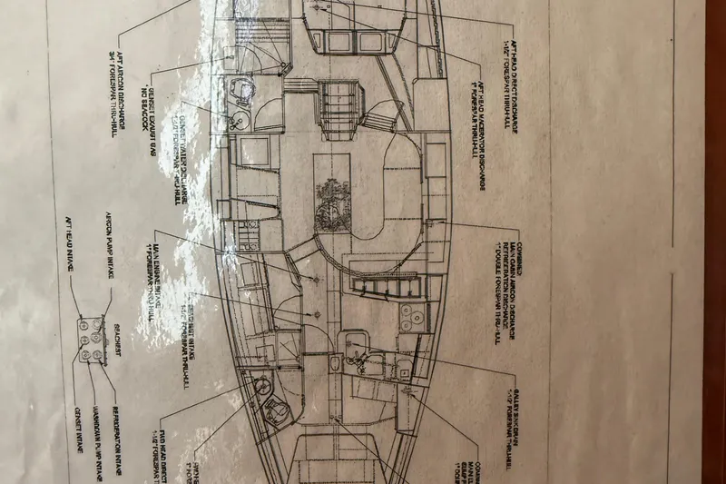 Slide: The Image of Blueprint of 2011 Tartan 4700 sailboat interior layout with labeled sections and features. - 64