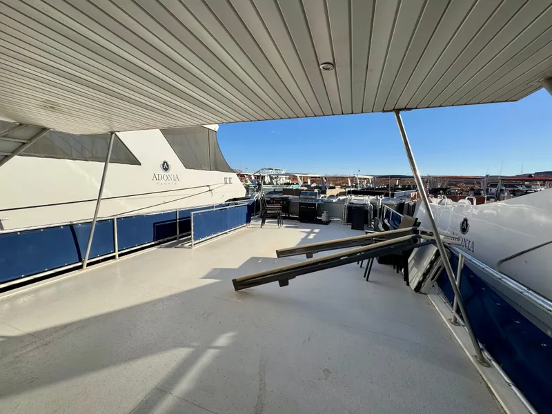 Slide: The Image of Spacious deck of 2013 Bravada Bella Luna Share #8 houseboat at marina. - 26