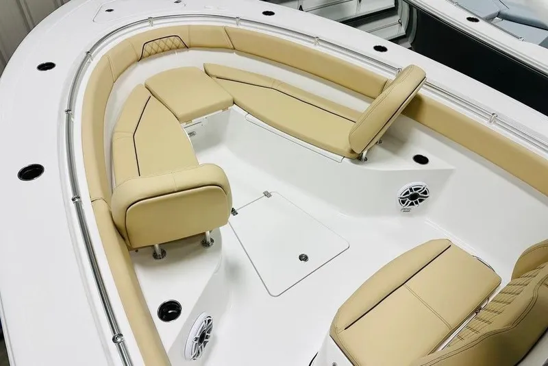 Slide: The Image of 2026 Sportsman Open 262 Center Console with beige seating and modern design. - 3