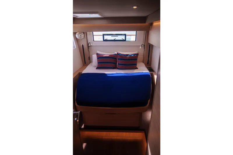 Slide: The Image of Luxurious cabin interior of 2024 Lagoon 51 yacht with cozy bedding. - 34