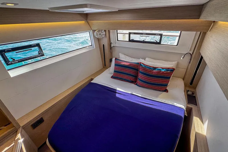 Slide: The Image of Luxurious cabin interior of 2024 Lagoon 51 yacht with ocean view. - 35