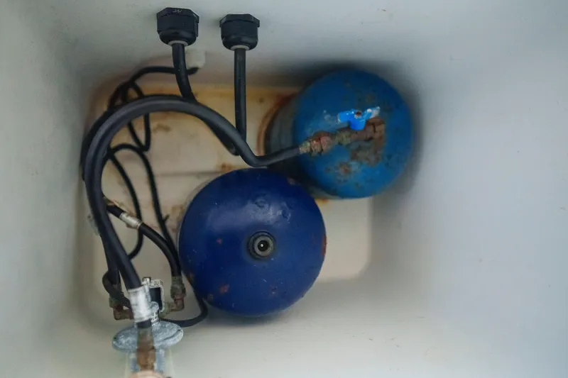 Slide: The Image of Interior view of Lagoon 51 yacht's 2024 gas cylinder compartment. - 50