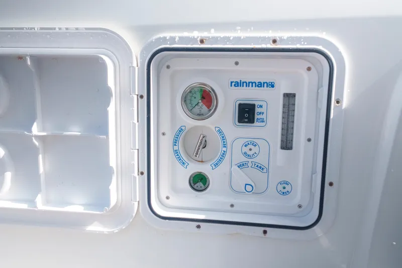 Slide: The Image of Control panel on 2024 Lagoon 51 yacht featuring Rainman water system. - 55