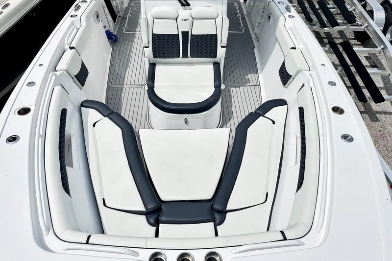 Slide: The Image of 2024 Tidewater 292 CC Adventure boat interior with luxurious seating and sleek design. - 6