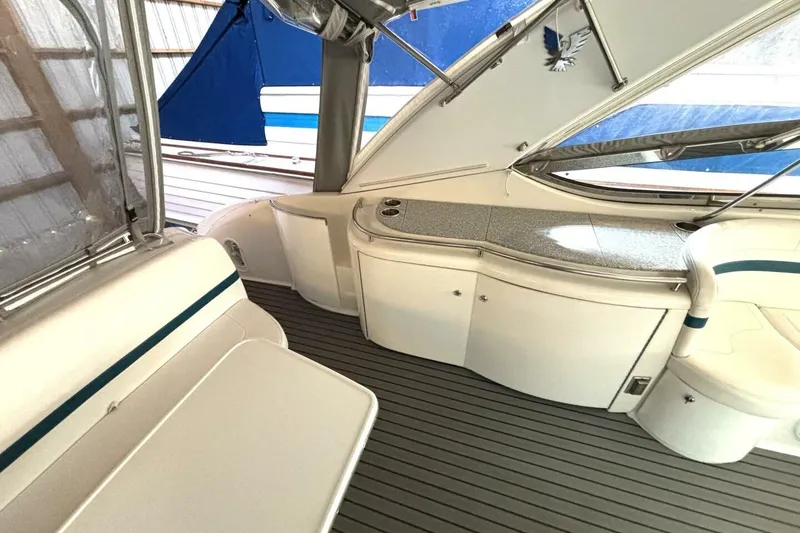 Slide: The Image of Interior of 2006 Formula 400 Super Sport Crossover boat with seating and counter space. - 19
