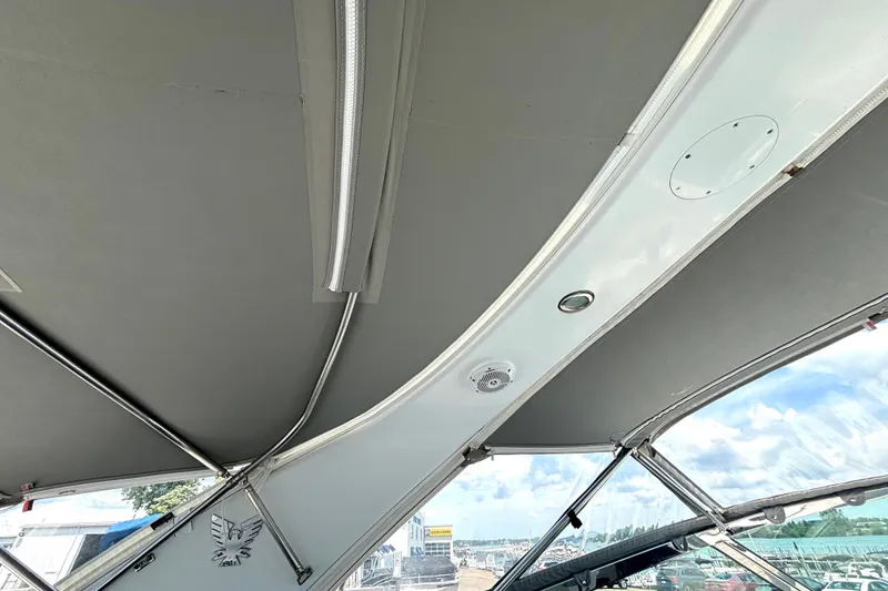 Slide: The Image of Interior view of a 2006 Formula 400 Super Sport Crossover boat canopy and framework. - 33
