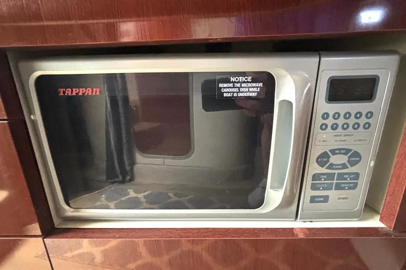 Slide: The Image of Tappan microwave in a 2006 Formula 400 Super Sport Crossover boat kitchen. - 39