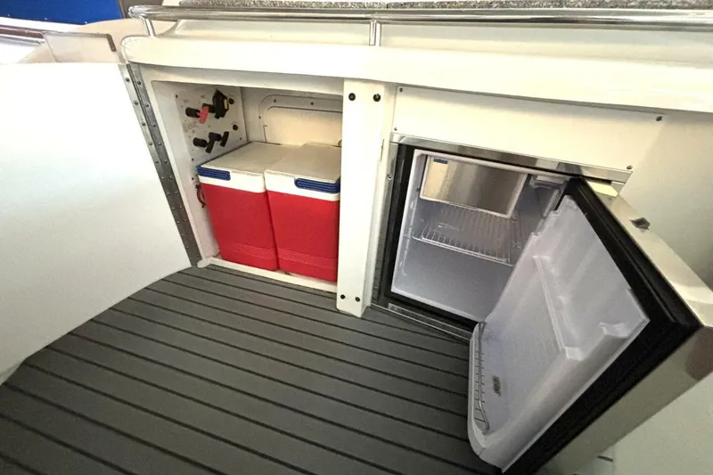 Slide: The Image of Interior of 2006 Formula 400 Super Sport Crossover with coolers and open fridge. - 21
