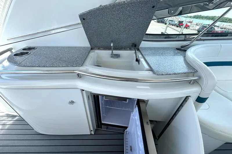 Slide: The Image of Interior of a 2006 Formula 400 Super Sport Crossover with sink and mini fridge. - 22