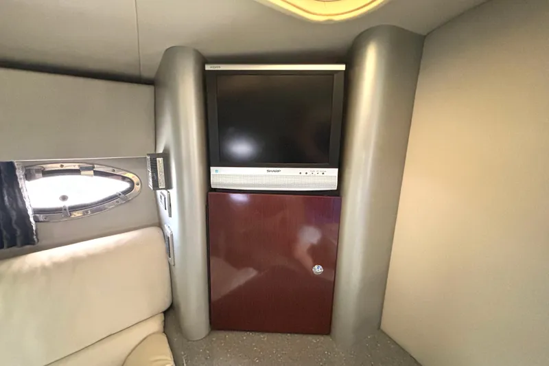 Slide: The Image of 2006 Formula 400 Super Sport Crossover interior with TV and porthole window. - 51
