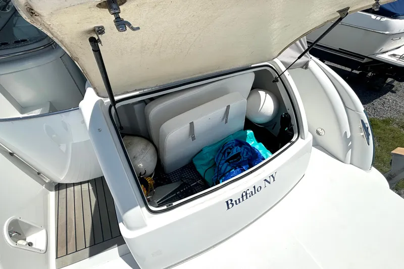 Slide: The Image of Open storage compartment on a 2006 Formula 400 Super Sport Crossover boat, Buffalo NY. - 15