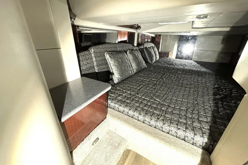 Slide: The Image of Interior cabin of 2006 Formula 400 Super Sport Crossover with luxurious bedding and modern design. - 39