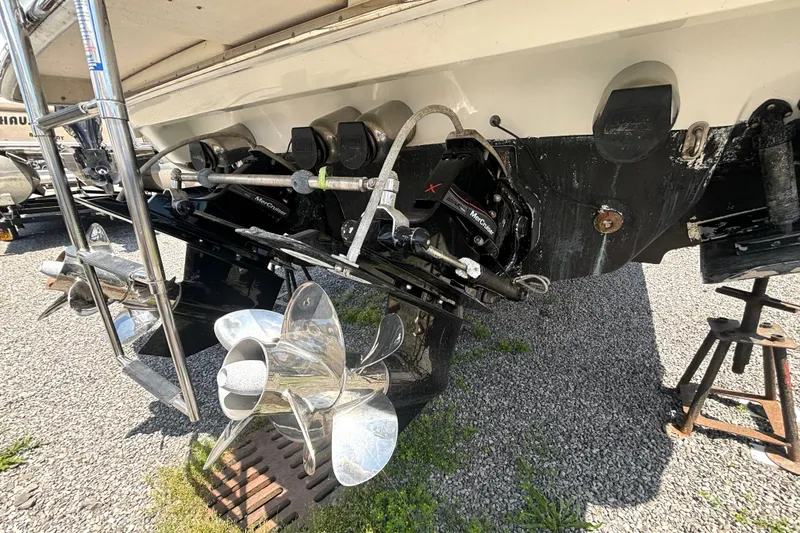 Slide: The Image of 2006 Formula 400 Super Sport Crossover boat with dual propellers and MerCruiser engine. - 56