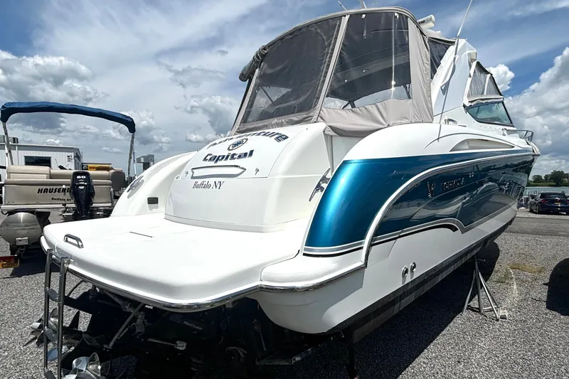 Slide: The Image of 2006 Formula 400 Super Sport Crossover boat in a marina, Buffalo, NY. - 6