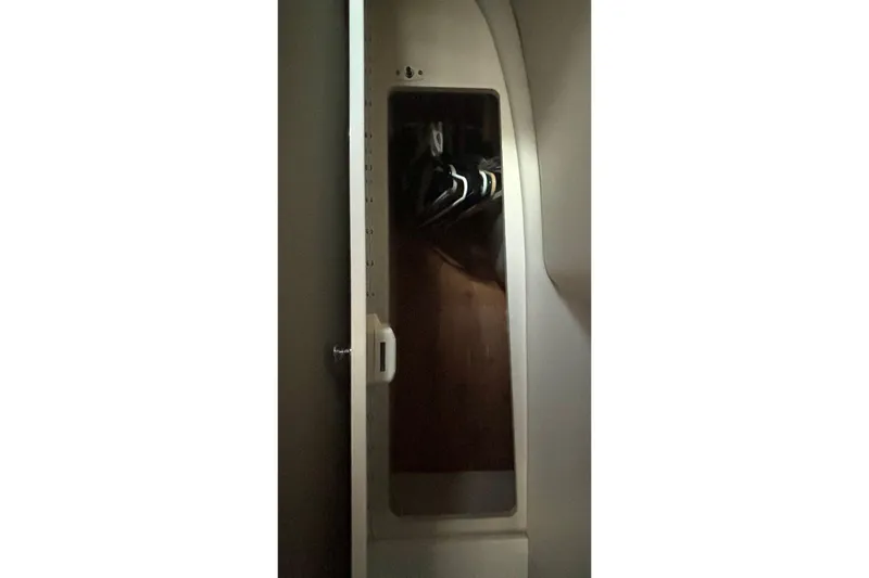 Slide: The Image of Interior closet of a 2006 Formula 400 Super Sport Crossover boat. - 48
