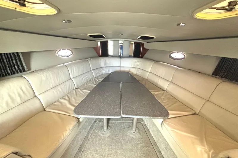Slide: The Image of Luxurious interior of a 2006 Formula 400 Super Sport Crossover yacht with plush seating. - 40