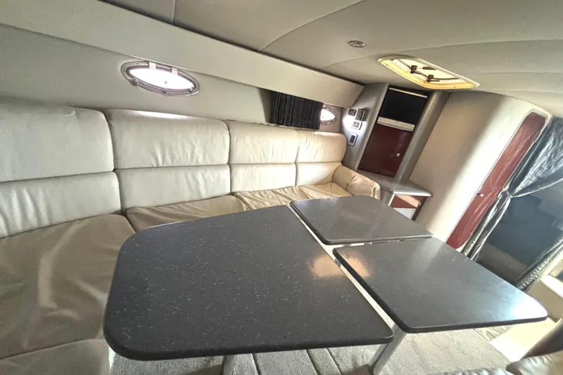 Slide: The Image of Interior of 2006 Formula 400 Super Sport Crossover with leather seating and sleek table. - 41