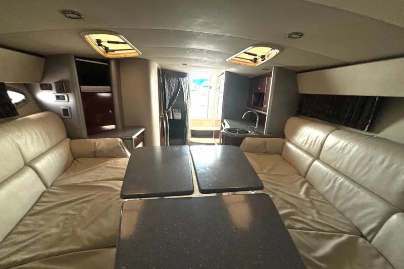 Slide: The Image of Interior of 2006 Formula 400 Super Sport Crossover with leather seating and dining area. - 42