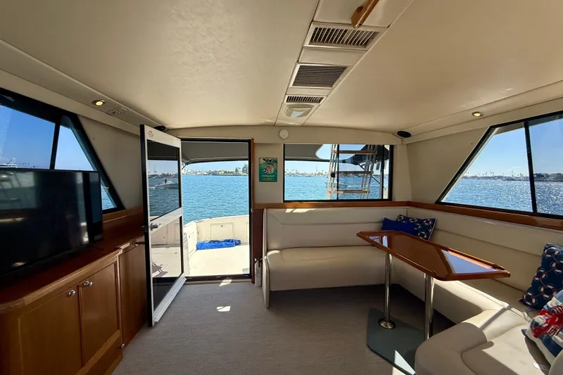 Slide: The Image of Interior of 1998 Riviera 43 Open Flybridge yacht with ocean view. - 19
