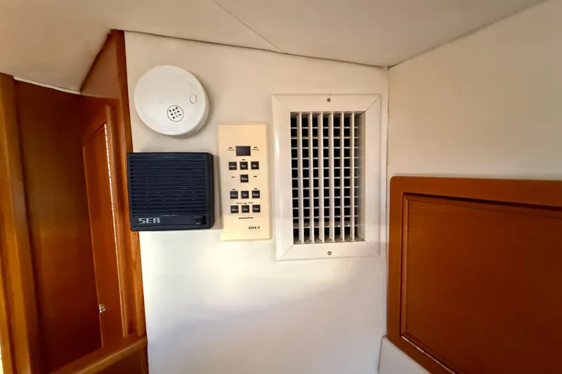 Slide: The Image of Interior controls and vent on 1998 Riviera 43 Open Flybridge yacht. - 38