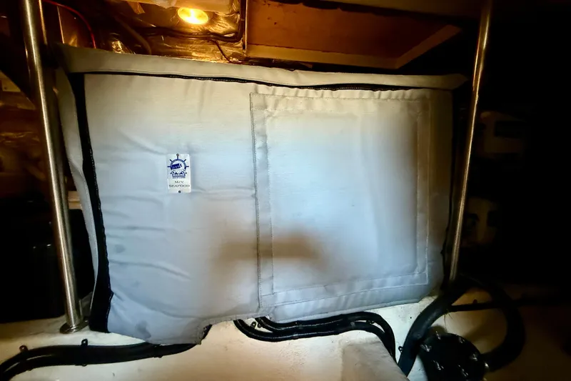 Slide: The Image of Engine room of 1998 Riviera 43 Open Flybridge with insulated cover and lighting. - 67