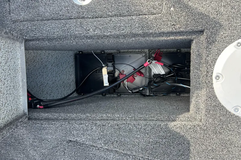 Slide: The Image of Battery compartment of 2026 Lund 1975 Tyee boat with wiring and connections. - 10