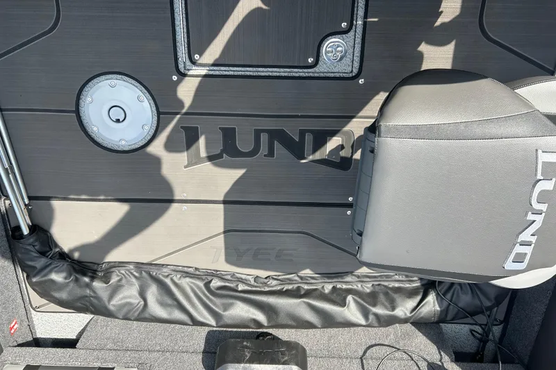 Slide: The Image of Interior of 2026 Lund 1975 Tyee boat with branded seating and deck. - 15