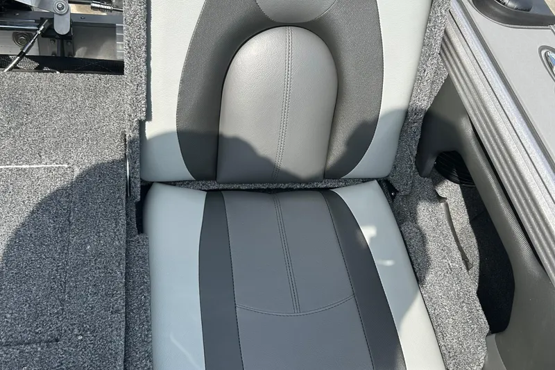 Slide: The Image of Gray and black seat in 2026 Lund 1975 Tyee boat interior. - 16