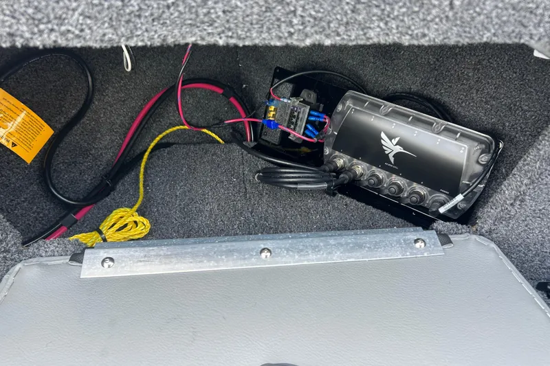 Slide: The Image of Interior wiring of 2026 Lund 1975 Tyee boat, featuring electronic components and cables. - 9