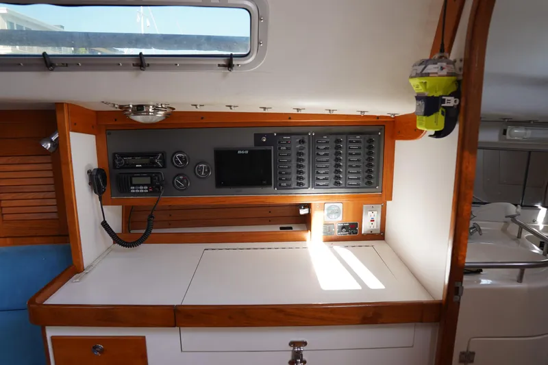 Slide: The Image of 2007 J Boats J/124 interior with navigation panel and communication equipment. - 12
