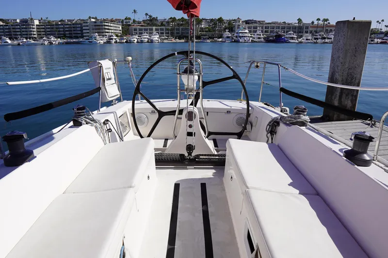 Slide: The Image of 2007 J Boats J/124 sailboat cockpit with marina view in background. - 16
