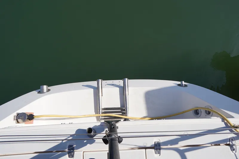 Slide: The Image of 2007 J Boats J/124 yacht stern with ladder and mooring line. - 17