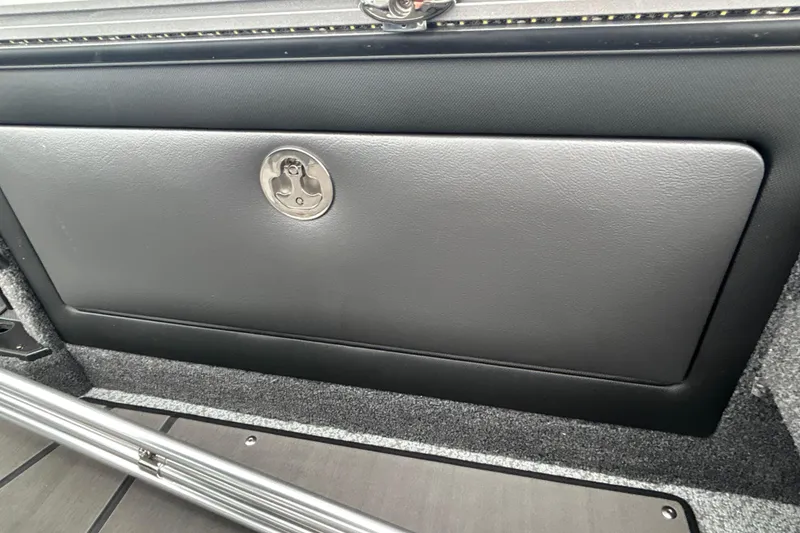Slide: The Image of Interior storage compartment of 2026 Lund 1975 Pro-V boat with sleek design. - 25