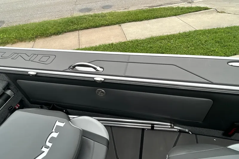 Slide: The Image of Interior of 2026 Lund 1975 Pro-V boat with sleek seating and storage. - 26