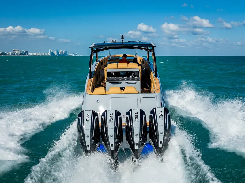 Slide: The Image of 2024 Concept 44' Open boat cruising on ocean with four powerful outboard engines. - 5