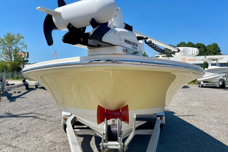 Slide: The Image of 2022 Hewes Redfisher 21 boat with Minn Kota trolling motor on trailer. - 10