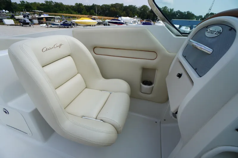Slide: The Image of Luxurious interior of 2007 Chris-Craft Corsair 28 boat with cream leather seating. - 19