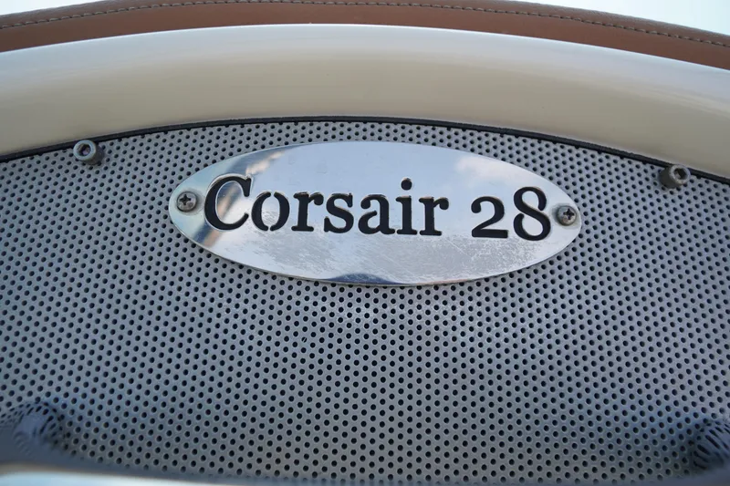 Slide: The Image of Chris-Craft Corsair 28, 2007 model, metal nameplate on perforated surface. - 2