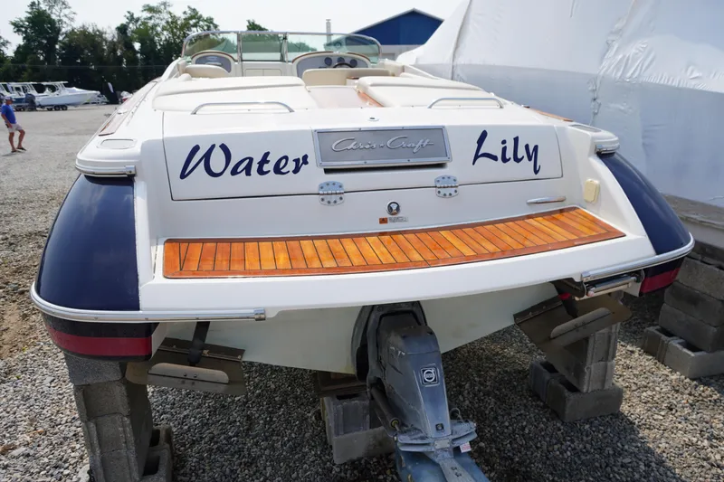 Slide: The Image of 2007 Chris-Craft Corsair 28 boat named "Water Lily" on dry dock. - 32