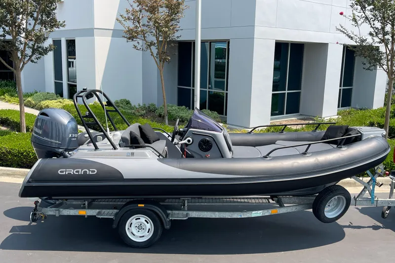 Slide: The Image of 2017 Grand Goldenline 500 boat on trailer. - 13