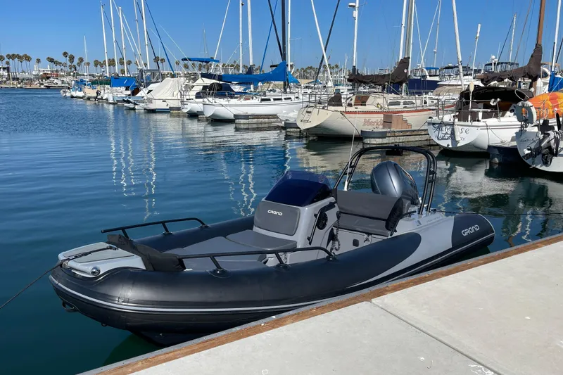 Slide: The Image of 2017 Grand Goldenline 500 boat docked in a marina. - 18