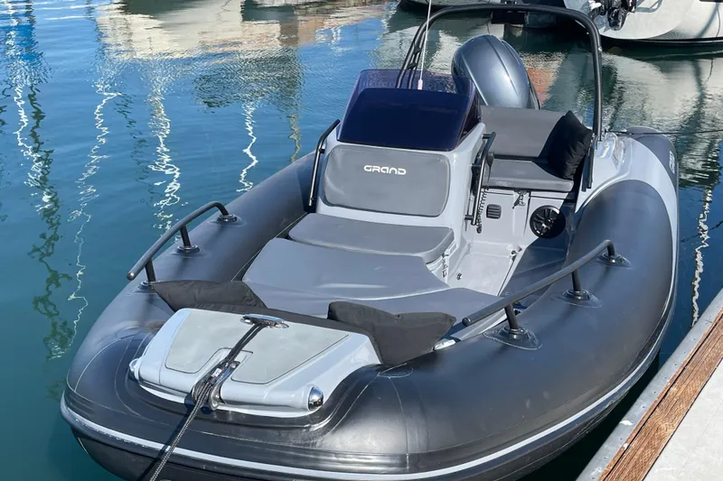 Slide: The Image of 2017 Grand Goldenline 500 inflatable boat docked. - 19